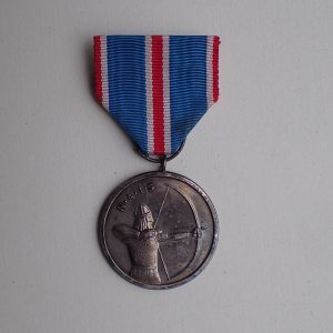 N.A.I.S. medaljen i sølv. (EIK 830 S).
