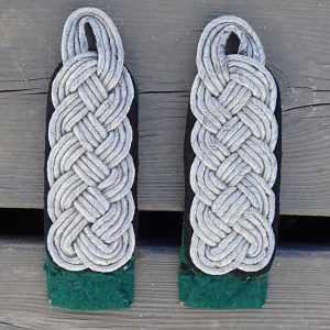 Major i Statspolitiet brukte skulderklaffer.