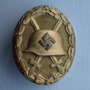 Såret merke i gull. (Hauptmunzamt. Wien).