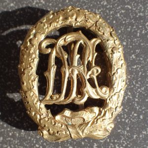 DRA sportsmerke i bronse. (MACK & PURBS. BERLIN).